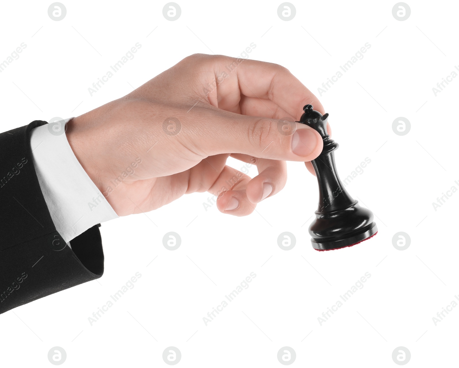 Photo of Man holding chess queen on white background, closeup. Competition concept