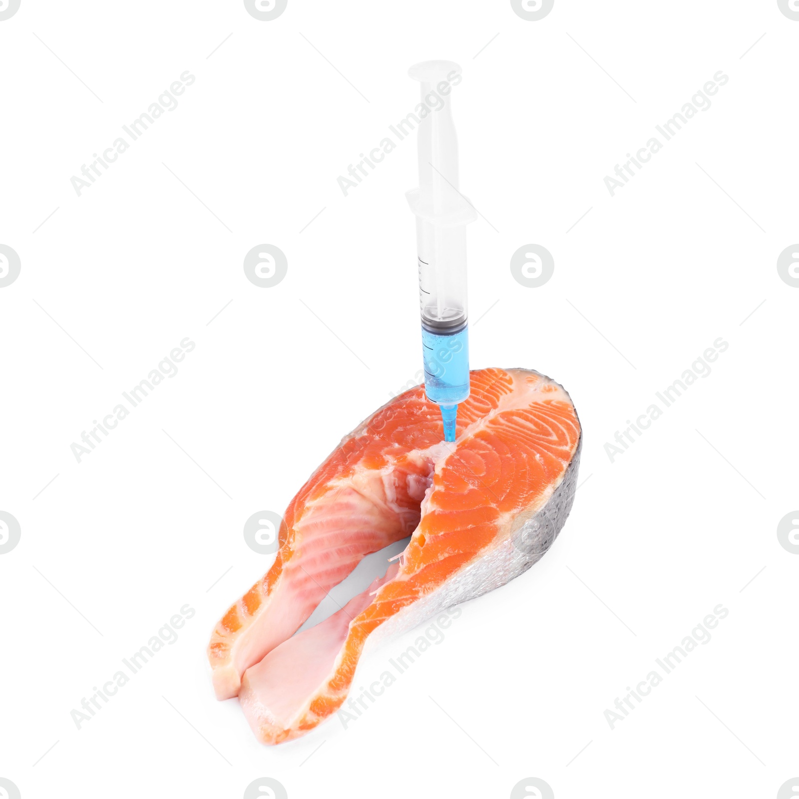 Photo of GMO concept. Piece of salmon and syringe isolated on white