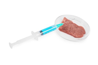 Photo of GMO concept. Piece of meat and syringe isolated on white