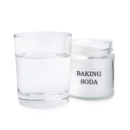 Photo of Glass of water and baking soda on white background