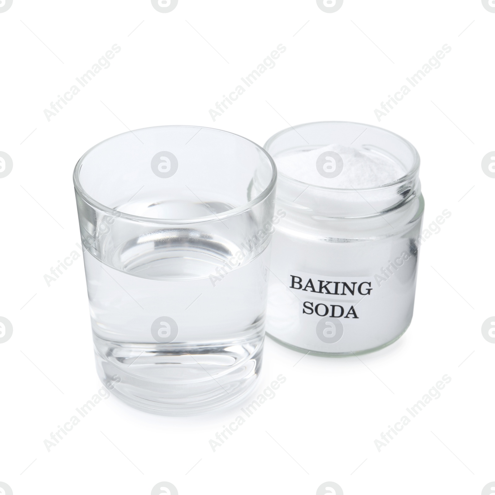 Photo of Glass of water and baking soda on white background