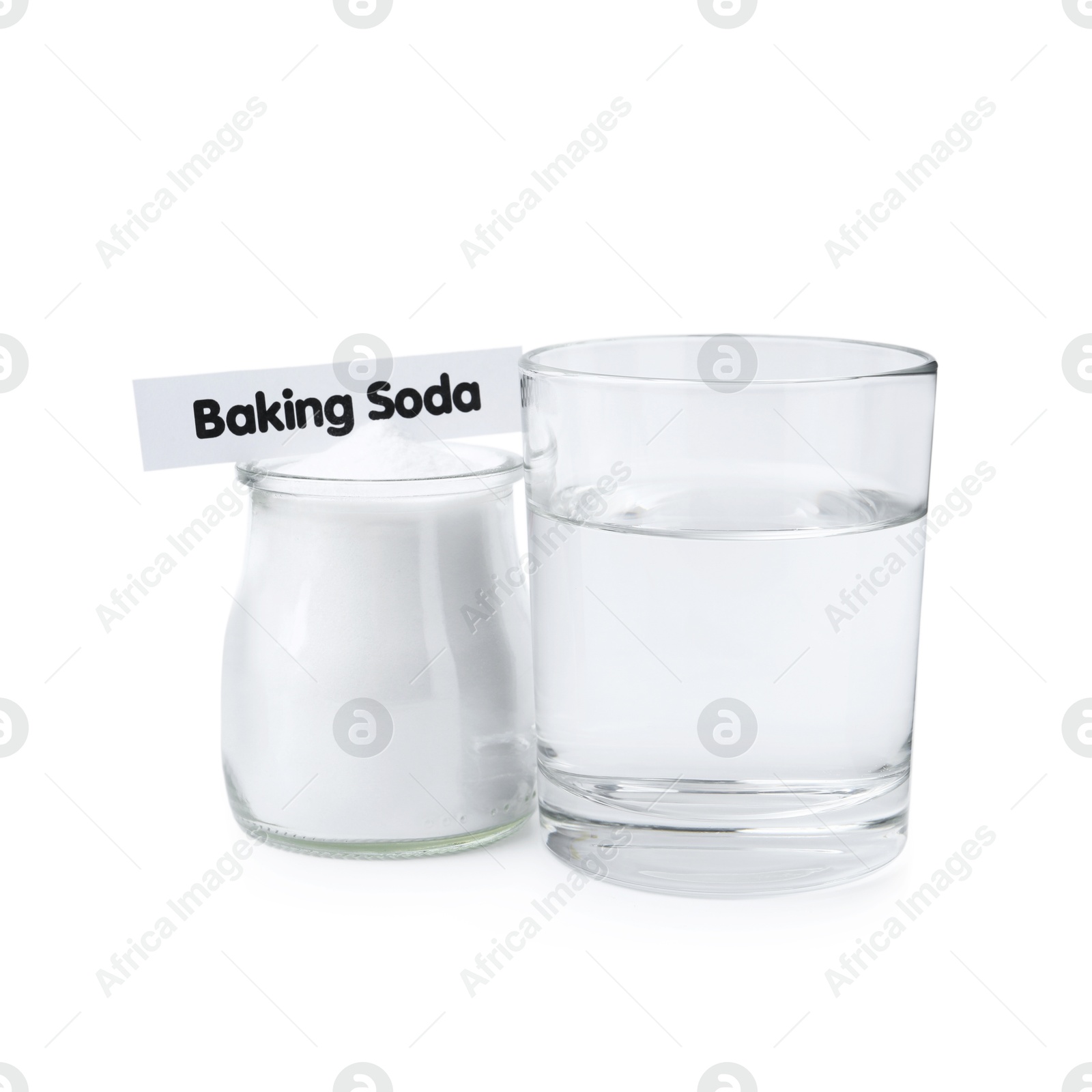 Photo of Glass of water and baking soda on white background