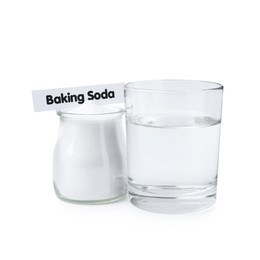 Glass of water and baking soda on white background