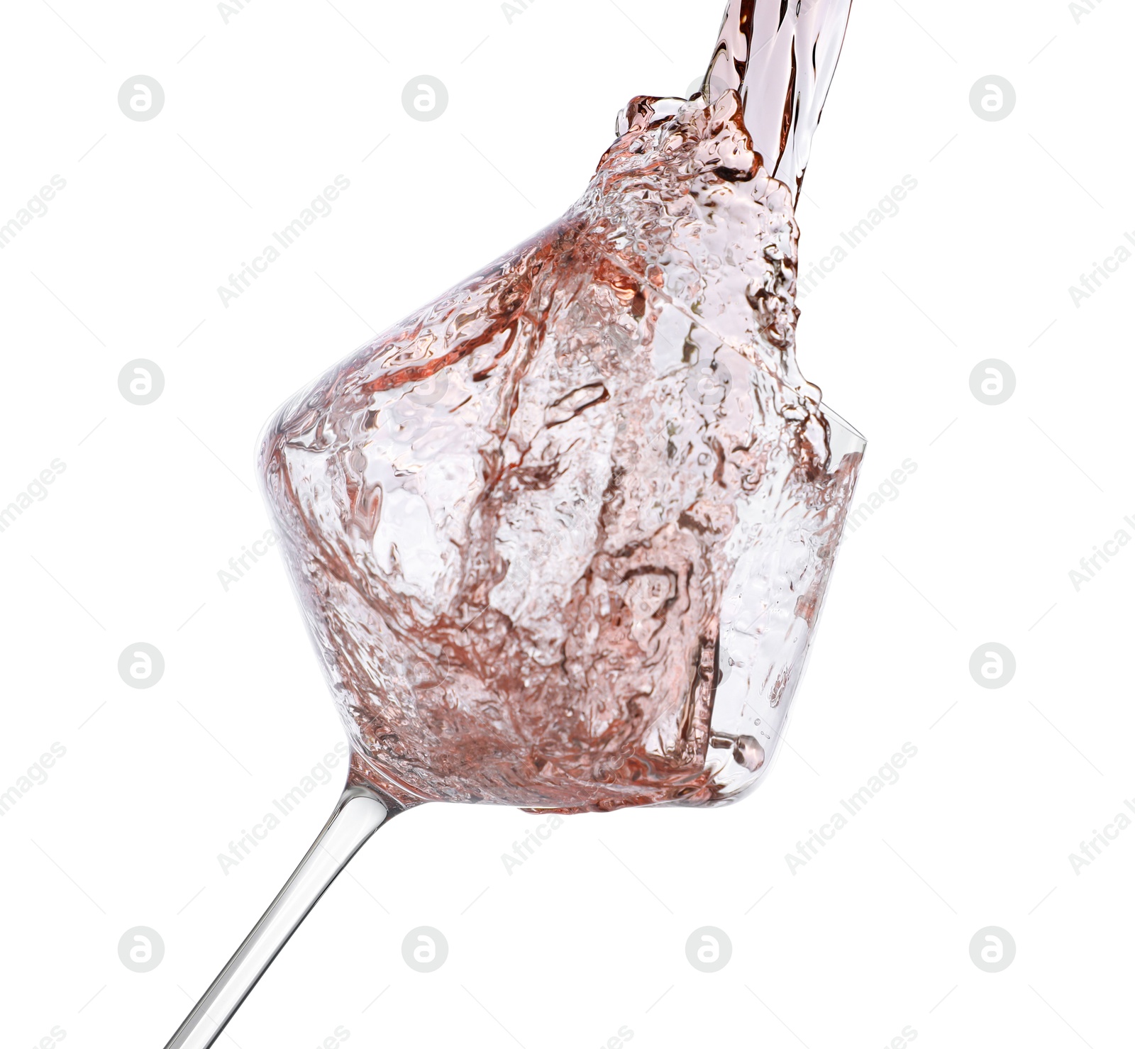 Photo of Pouring rose wine into glass isolated on white