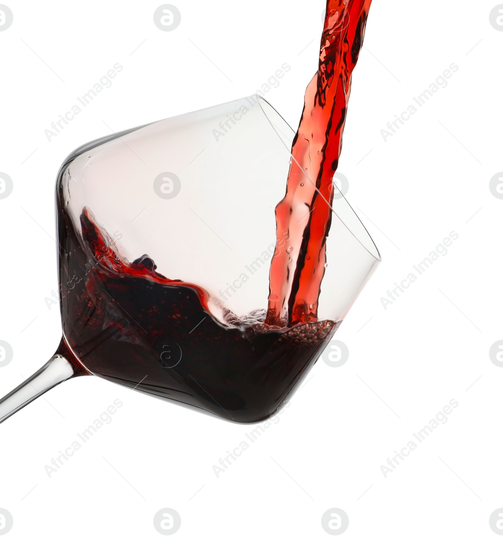 Photo of Pouring red wine into glass isolated on white