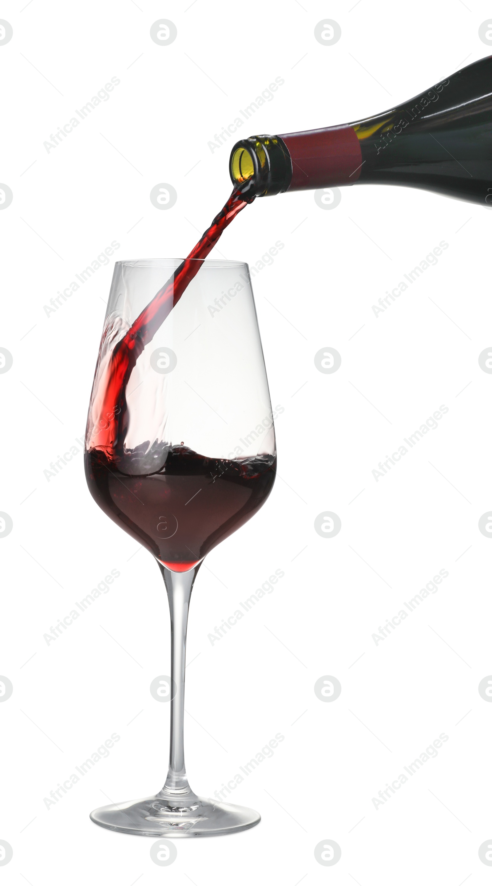 Photo of Pouring wine into glass on white background