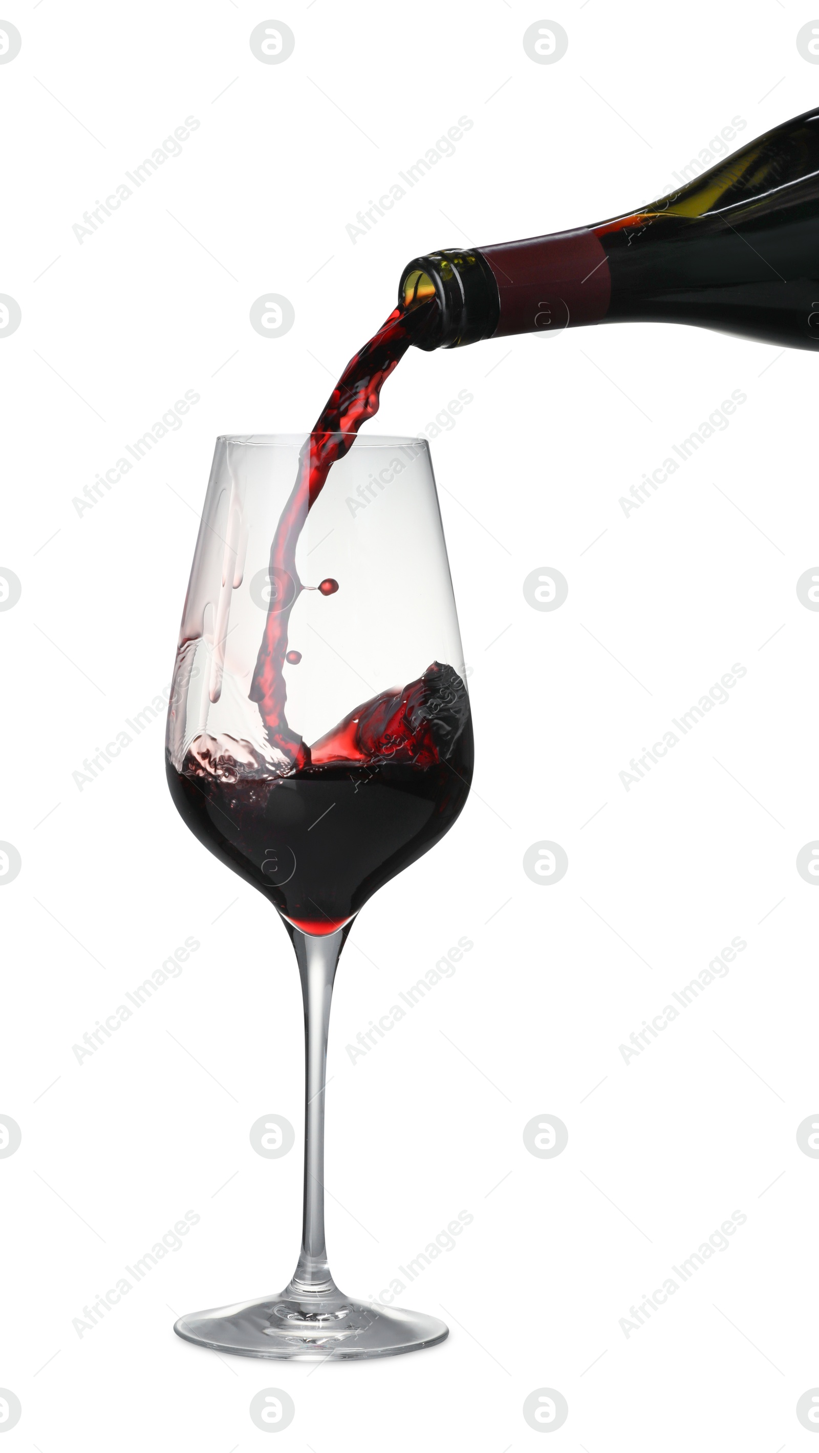 Photo of Pouring wine into glass on white background