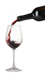 Photo of Pouring wine into glass on white background