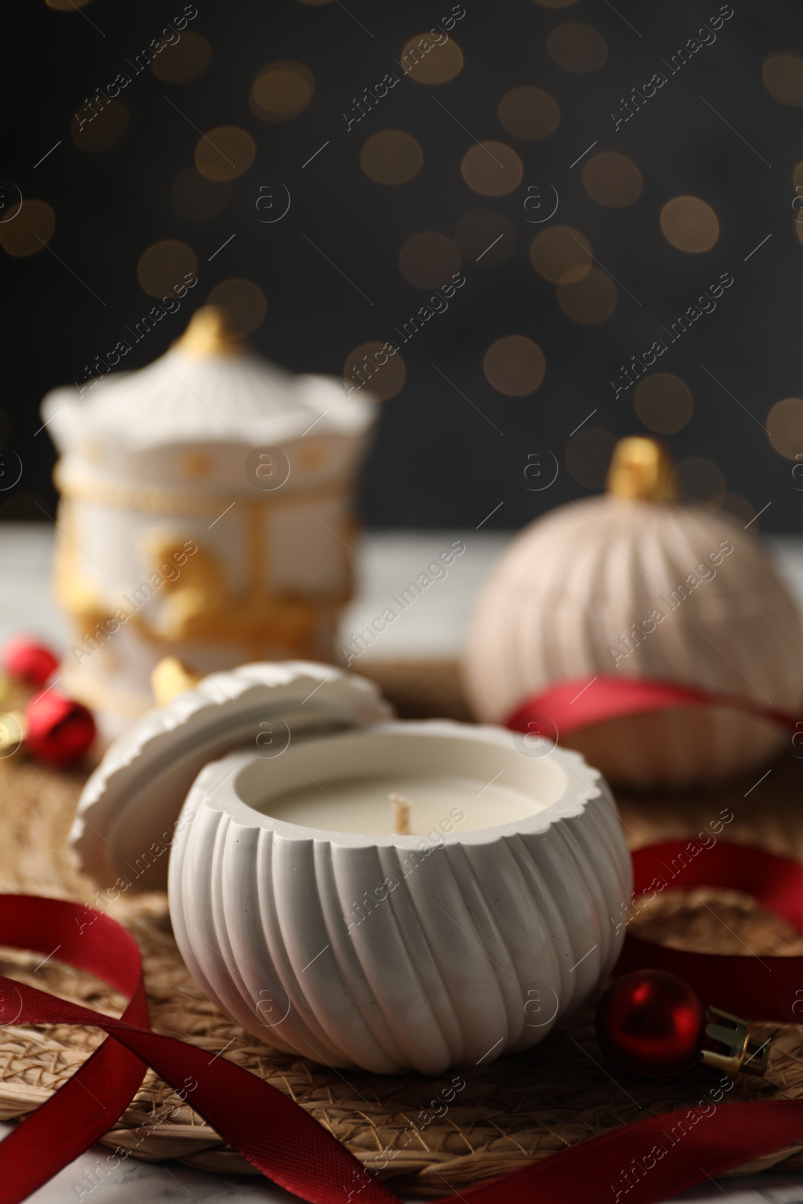 Photo of Soy wax candles on table, closeup. Beautiful Christmas decor