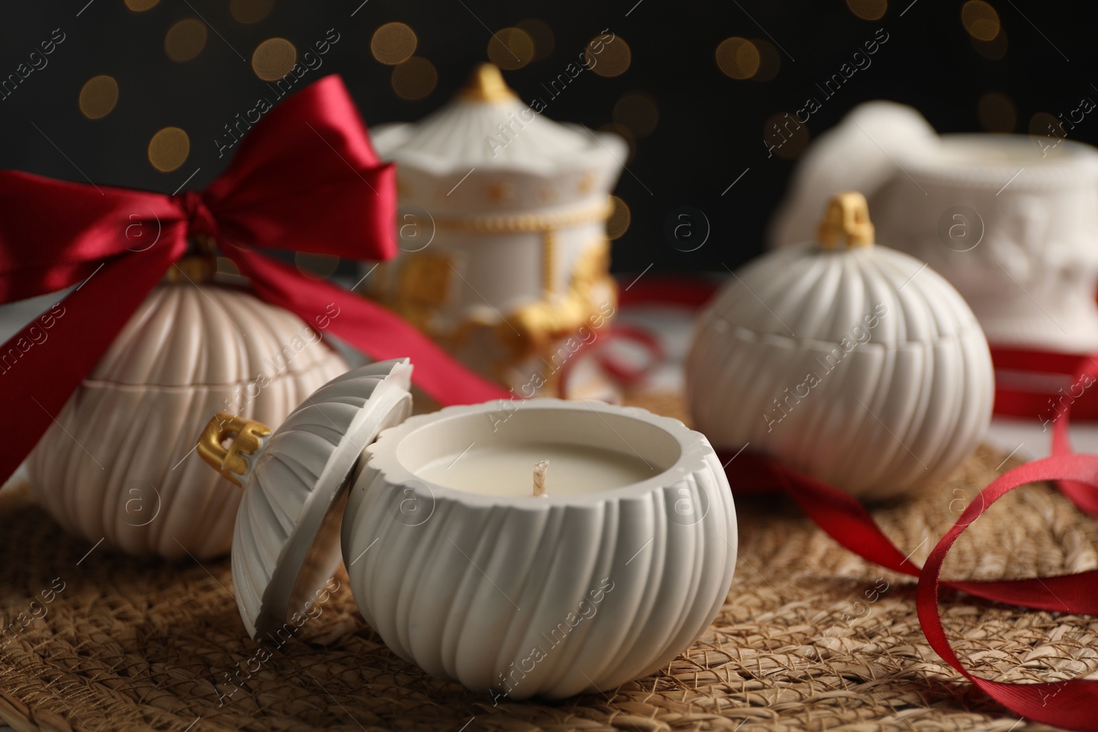 Photo of Soy wax candles on table, closeup. Beautiful Christmas decor