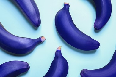 Image of Blue bananas on light background, flat lay