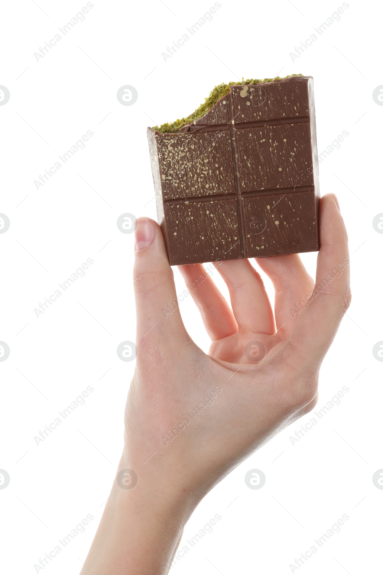 Photo of Woman holding piece of Dubai chocolate bar with pistachio and knafeh on white background, closeup