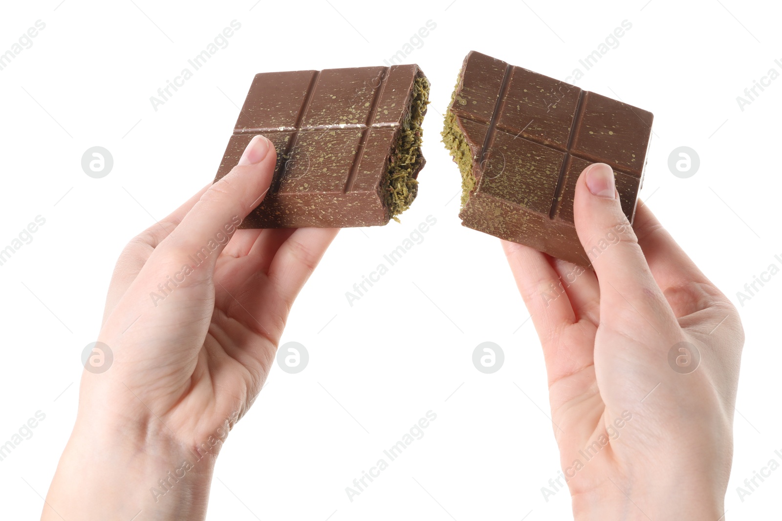 Photo of Woman breaking Dubai chocolate bar with pistachio and knafeh on white background, closeup