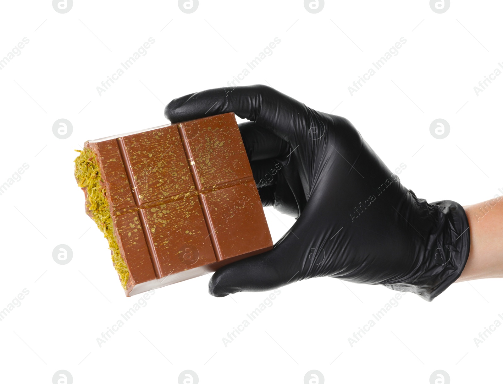 Photo of Woman holding piece of Dubai chocolate bar with pistachio and knafeh on white background, closeup