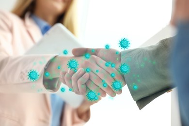 Image of People shaking hands, closeup. Pathogens transmission, illustration of microbes