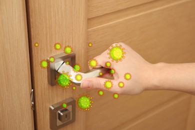 Image of Woman opening door, closeup. Pathogens transmission, illustration of microbes