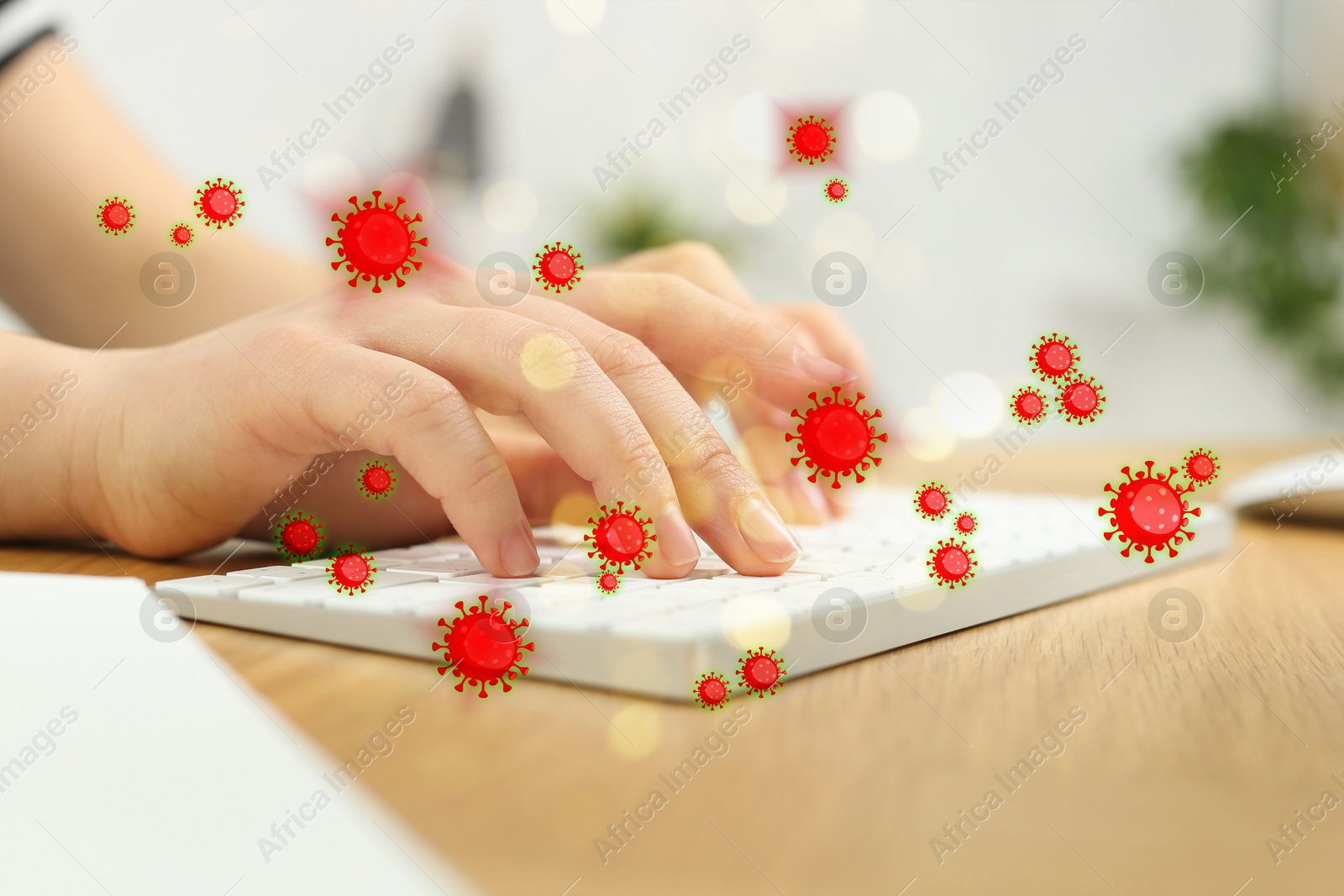 Image of Woman using computer keyboard, closeup. Pathogens transmission, illustration of microbes