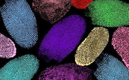 Image of Fingerprints of different colors on black background