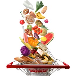 Image of Many different products falling into shopping cart on white background