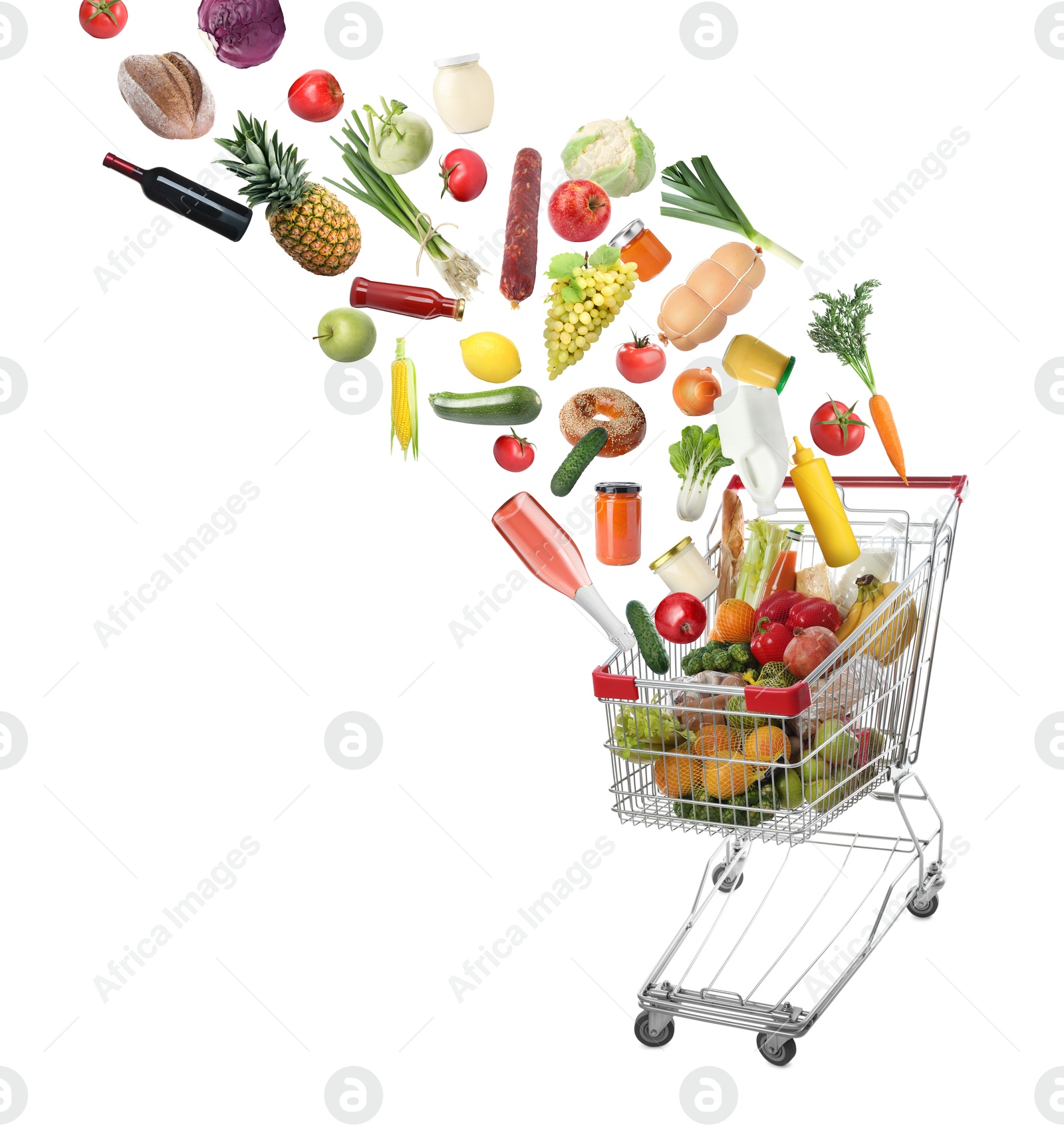 Image of Many different products falling into shopping cart on white background