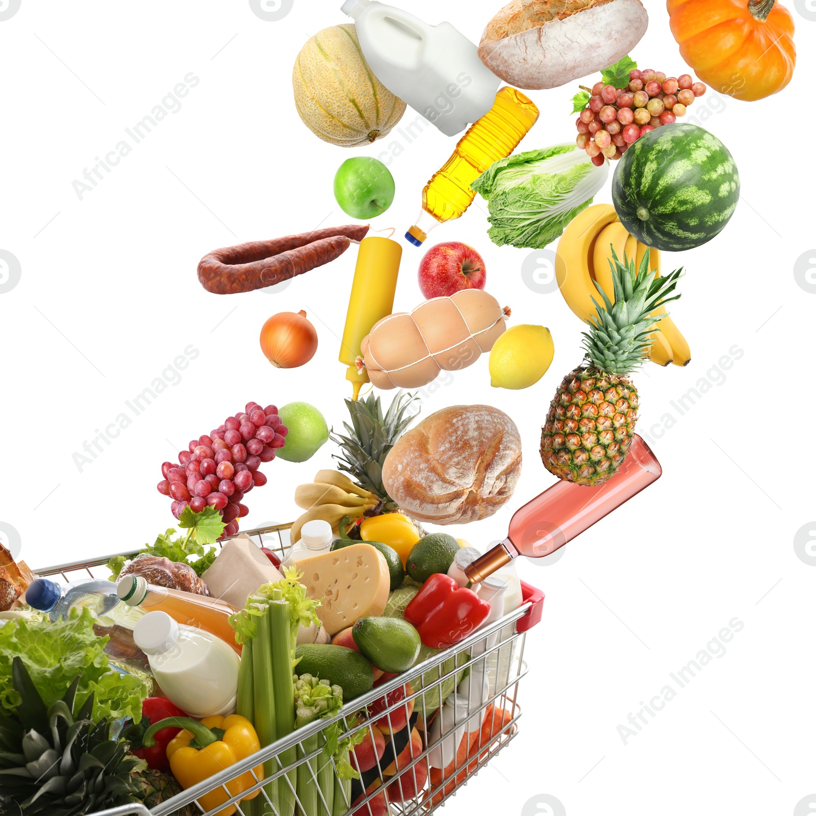 Image of Many different products falling into shopping cart on white background