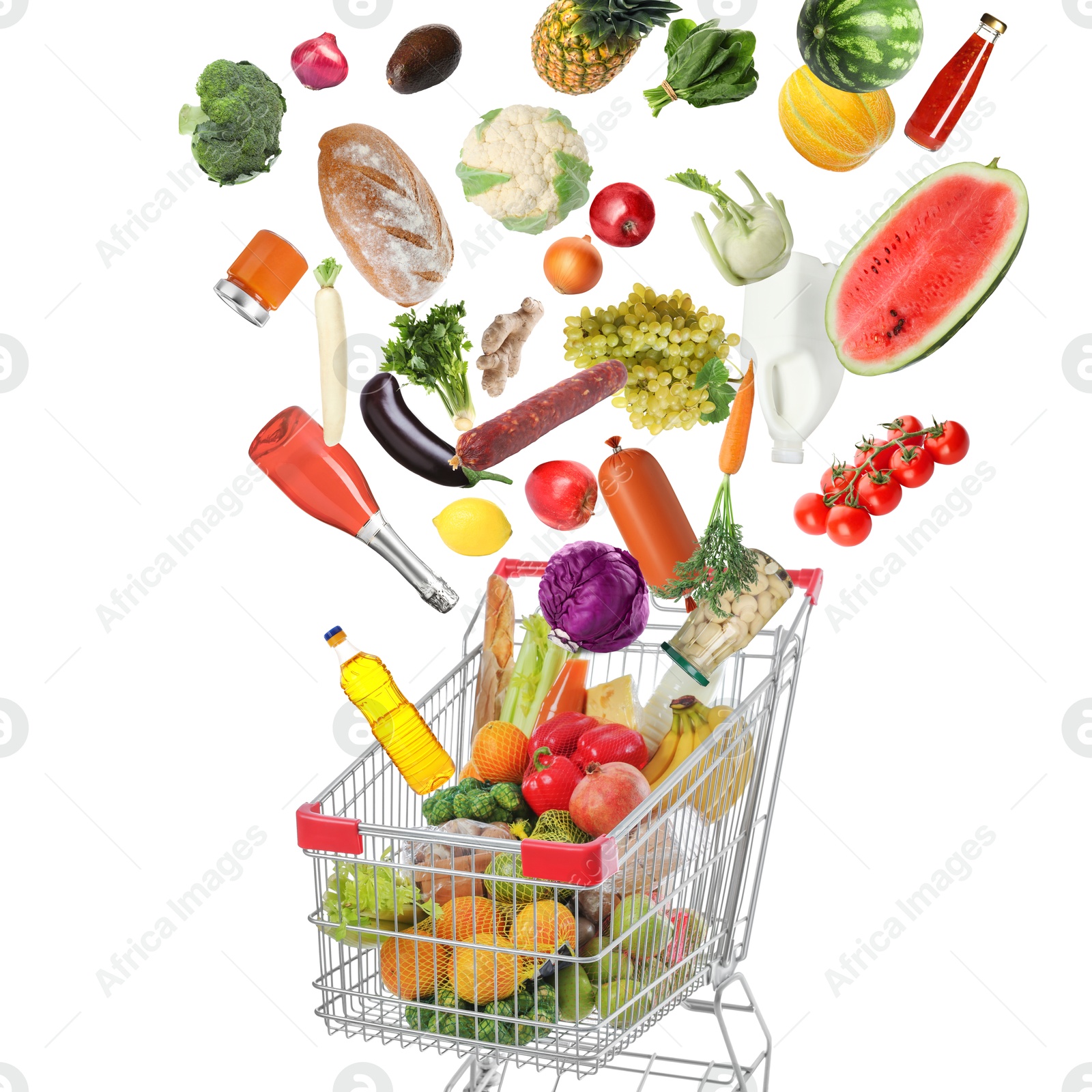 Image of Many different products falling into shopping cart on white background