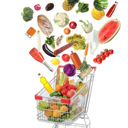 Image of Many different products falling into shopping cart on white background