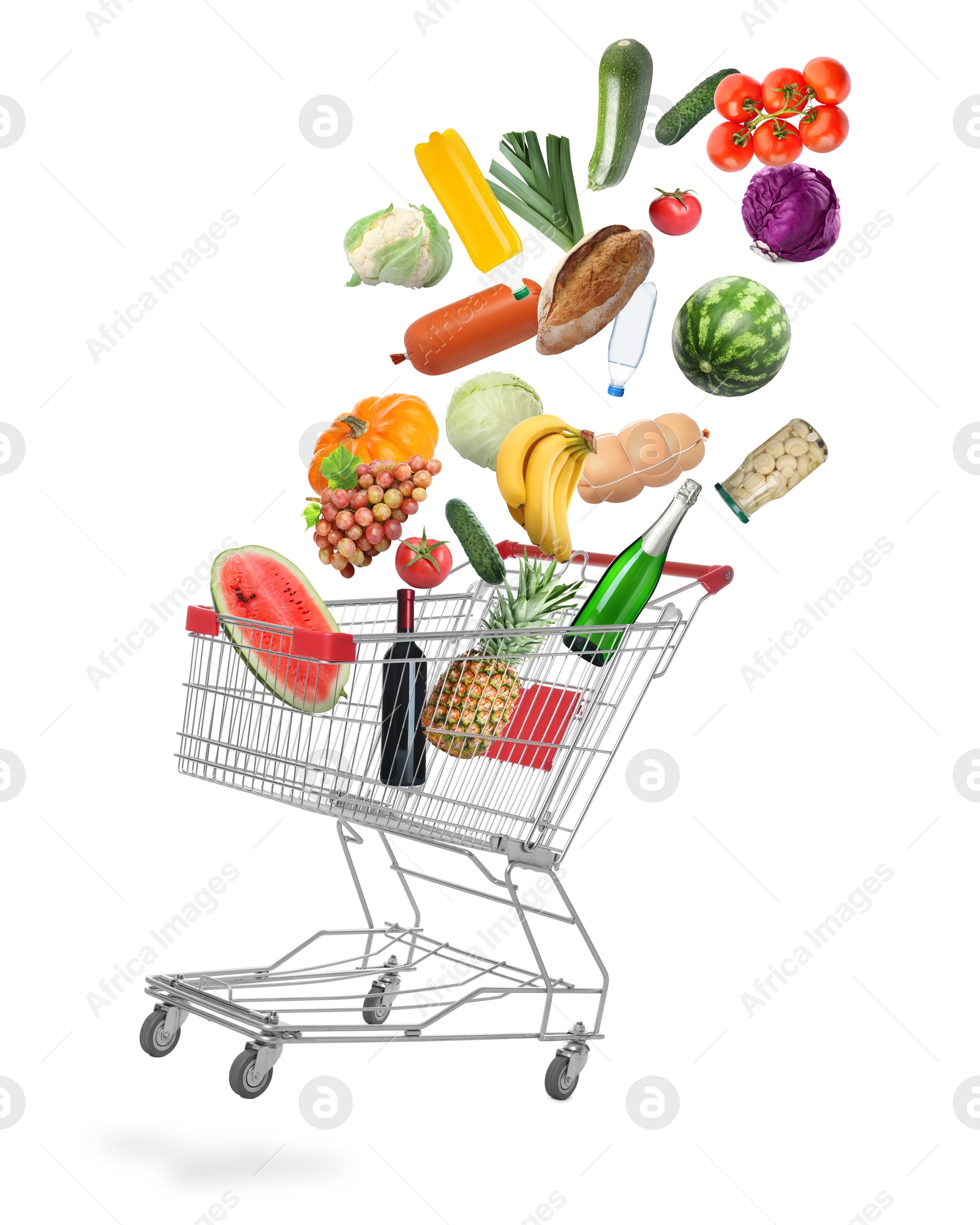 Image of Many different products falling into shopping cart on white background