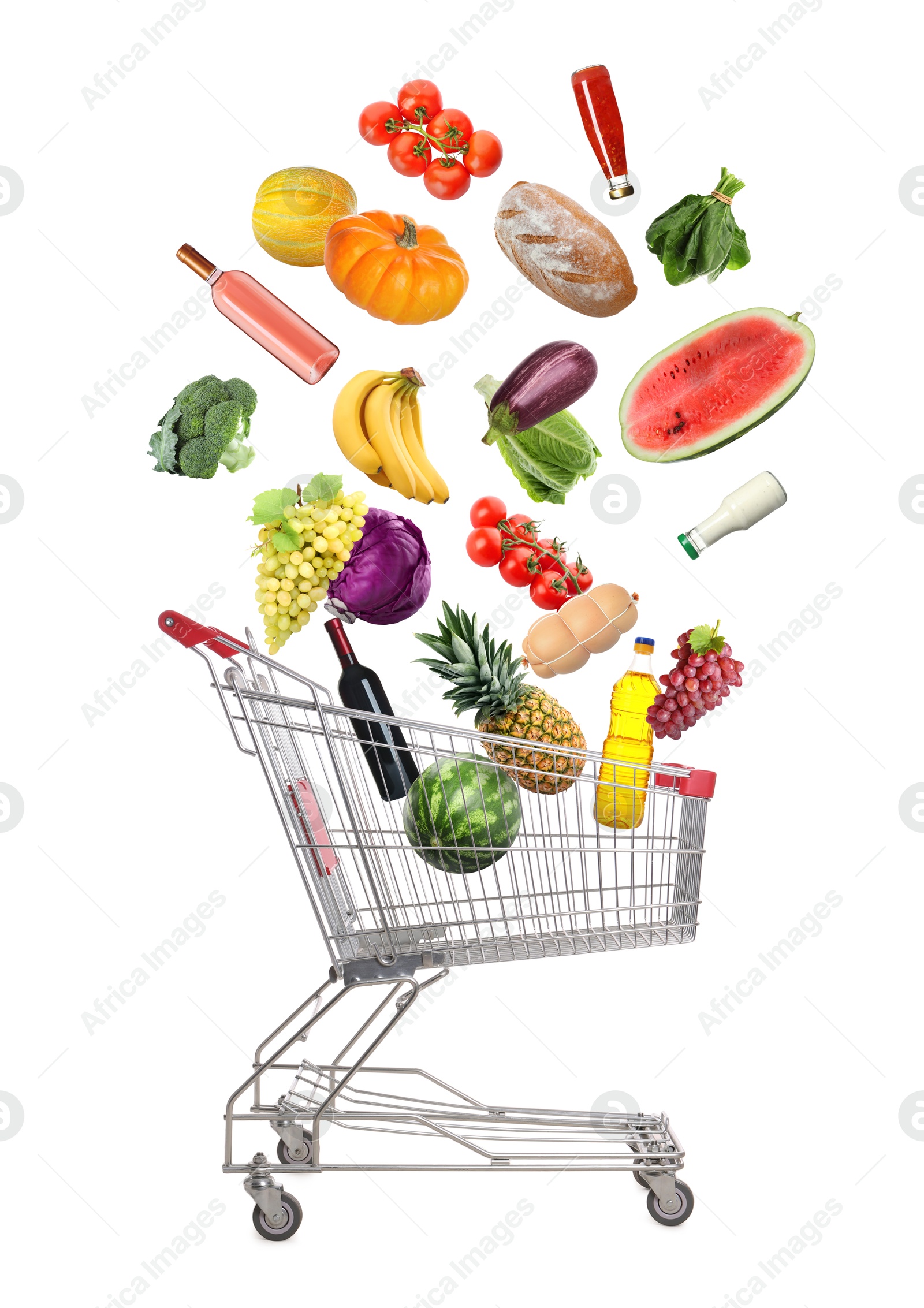 Image of Many different products falling into shopping cart on white background