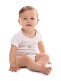 Photo of Cute little baby sitting on white background