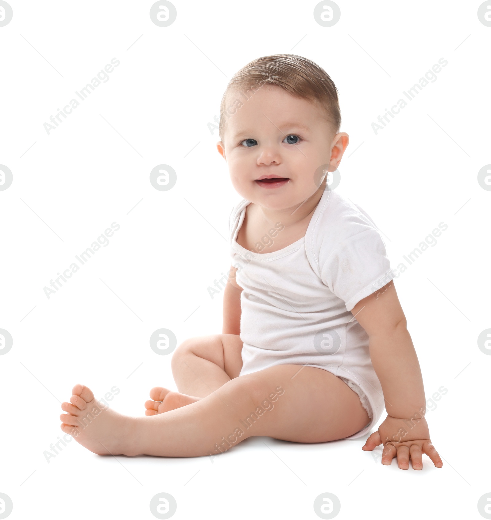 Photo of Cute little baby sitting on white background