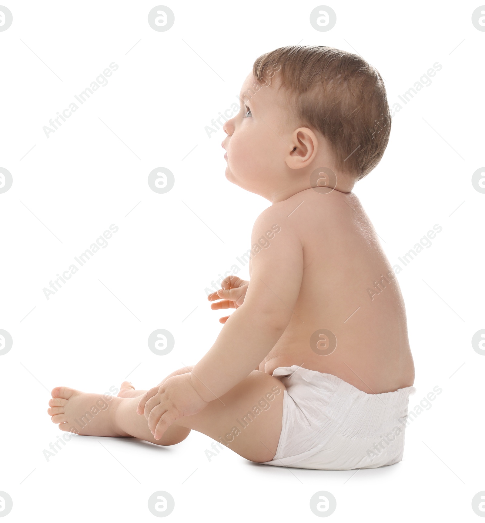 Photo of Cute little baby in diaper on white background