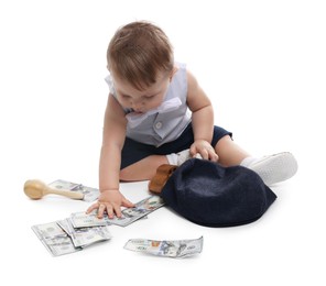 Photo of Little baby with money on white background