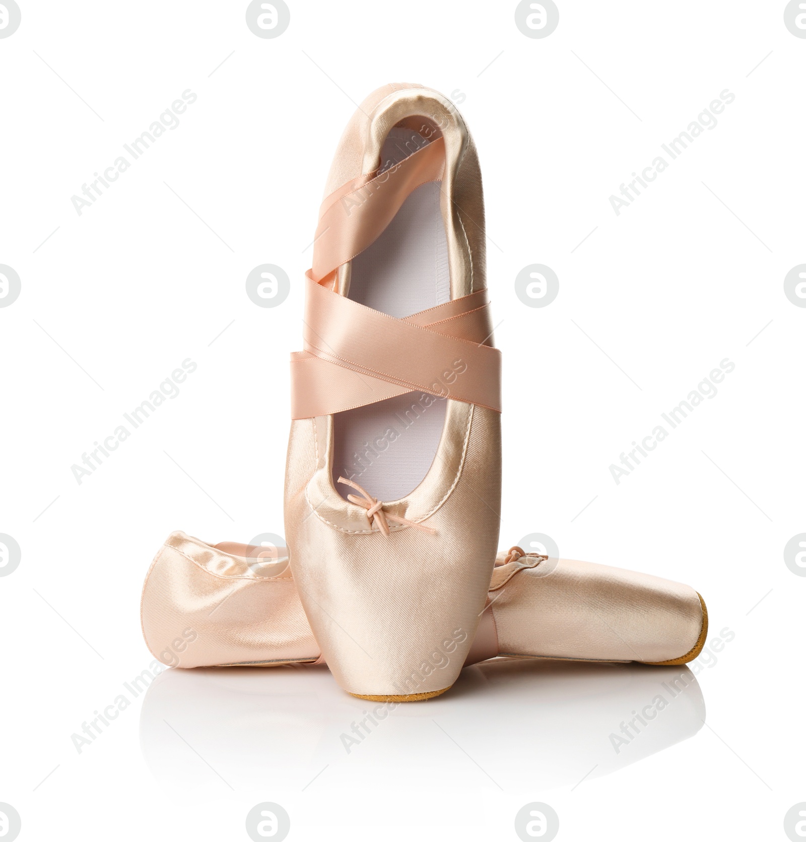 Photo of Pair of beautiful pointe shoes isolated on white