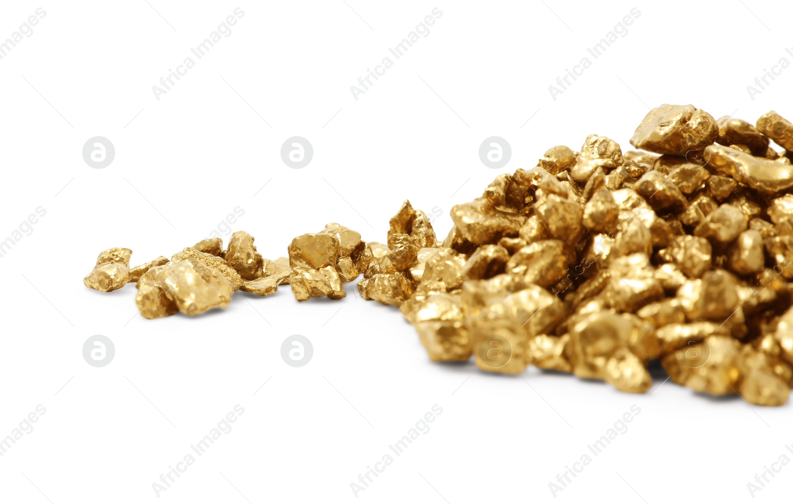 Photo of Heap of gold nuggets isolated on white