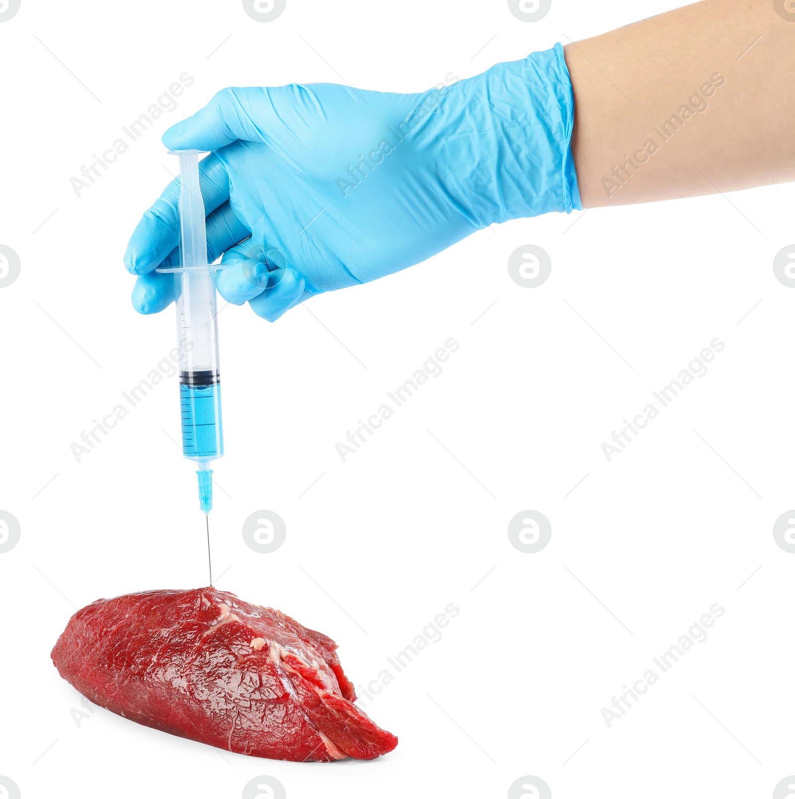 Photo of GMO concept. Scientist injecting something into piece of meat on white background, closeup