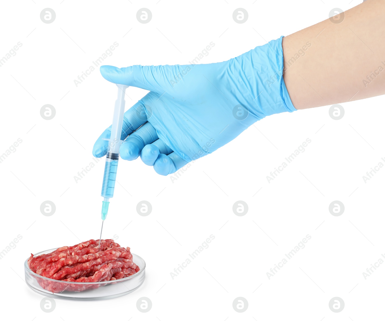 Photo of GMO concept. Scientist injecting something into minced meat on white background, closeup