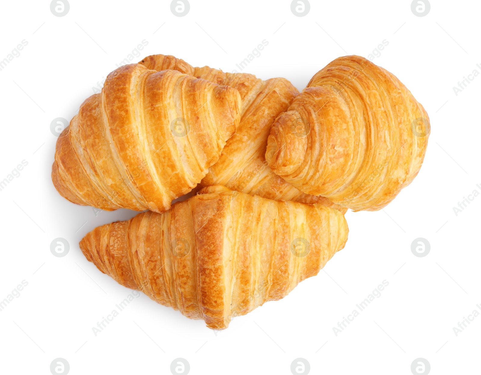 Photo of Tasty fresh croissants isolated on white, top view. Puff pastry