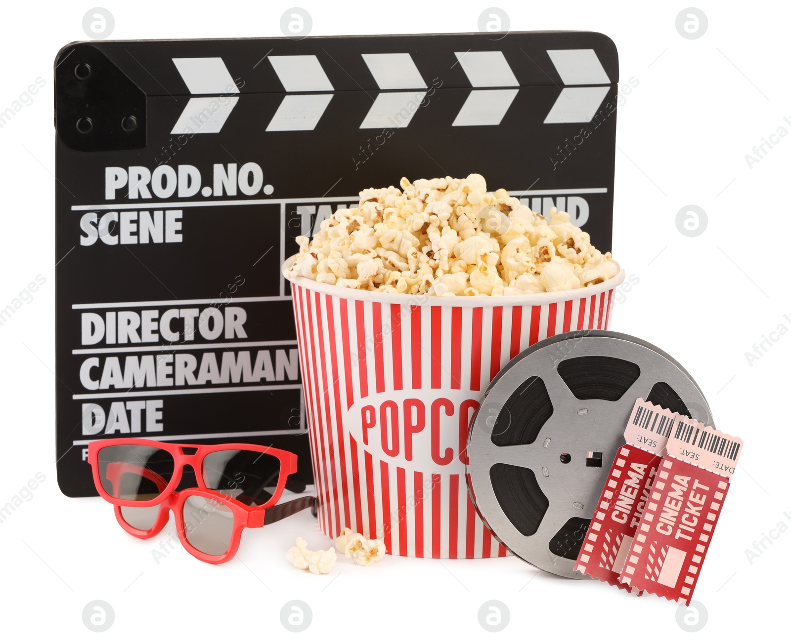 Photo of Tasty popcorn, film reel, clapper, glasses and movie tickets isolated on white