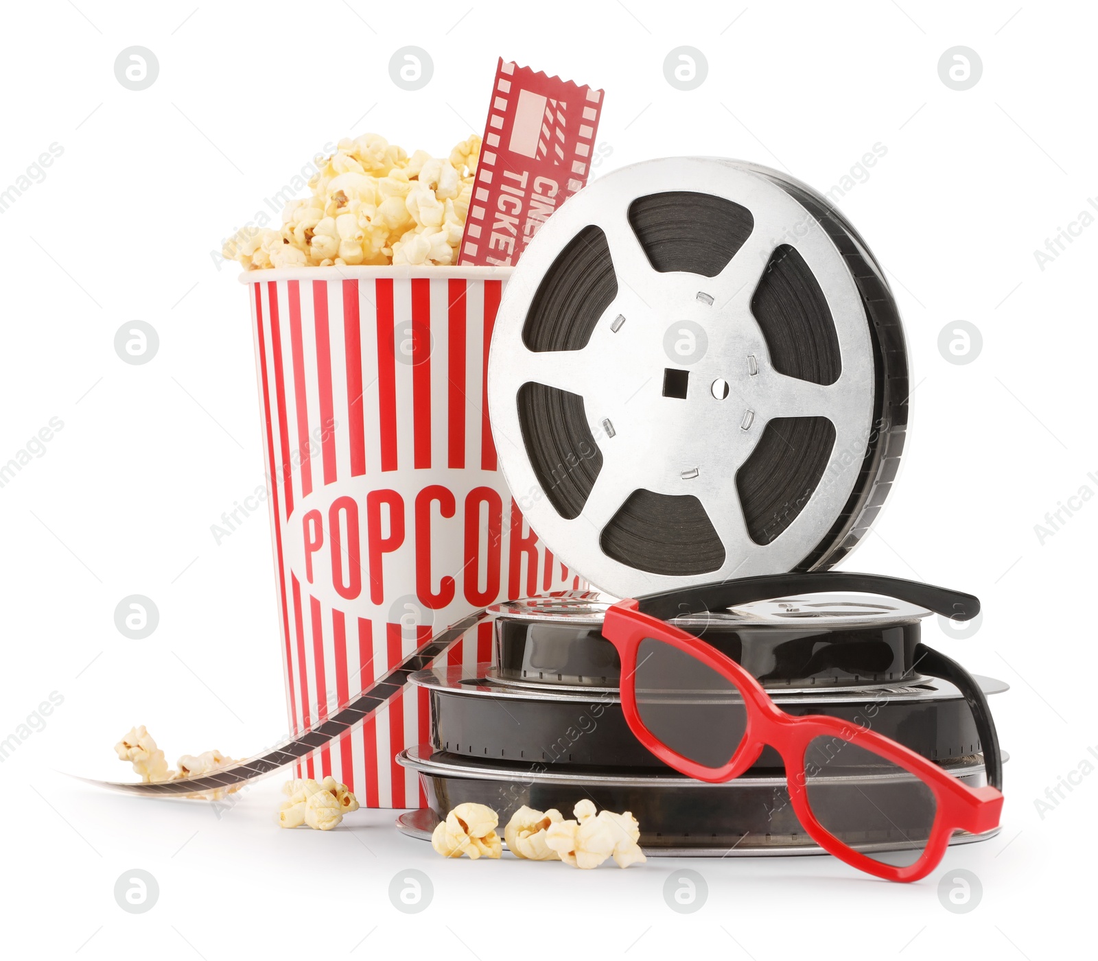 Photo of Tasty popcorn, film reels, glasses and movie ticket isolated on white