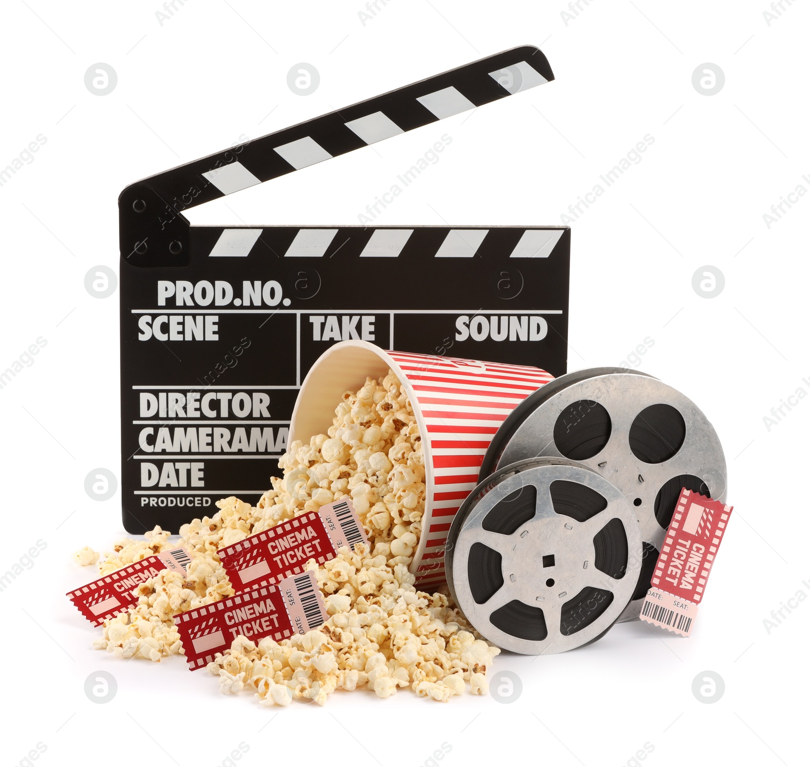 Photo of Tasty popcorn, film reels, clapper and movie tickets isolated on white