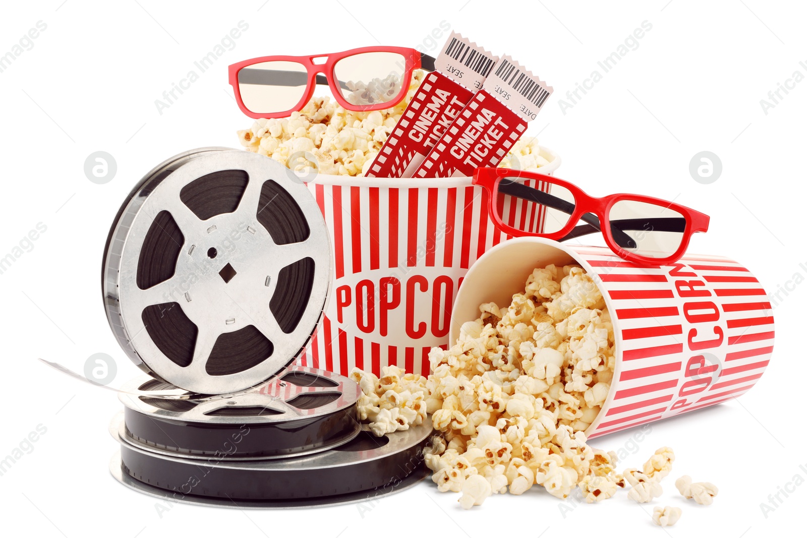 Photo of Tasty popcorn, film reels, glasses and movie tickets isolated on white