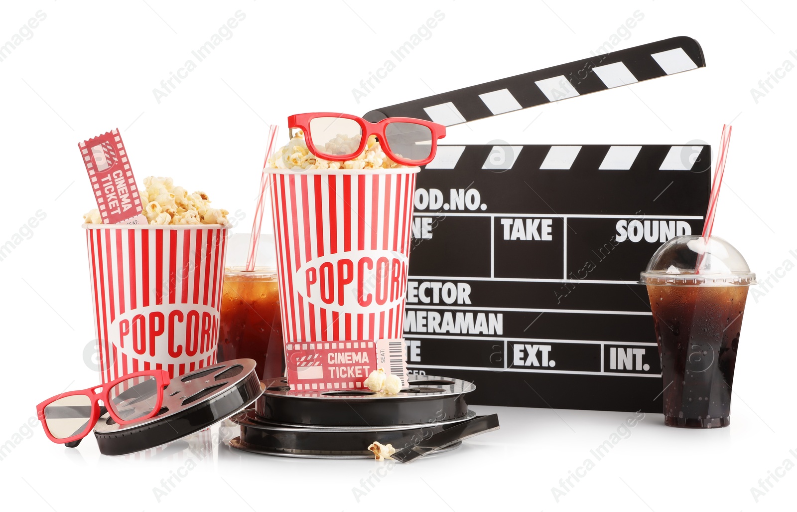 Photo of Tasty popcorn, glasses, film reels, soda drinks, clapper and movie ticket isolated on white