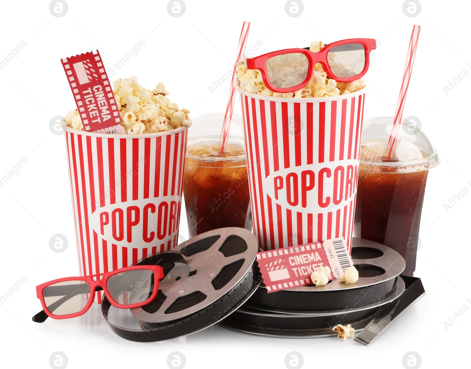 Photo of Tasty popcorn, glasses, film reels, soda drinks and movie tickets isolated on white