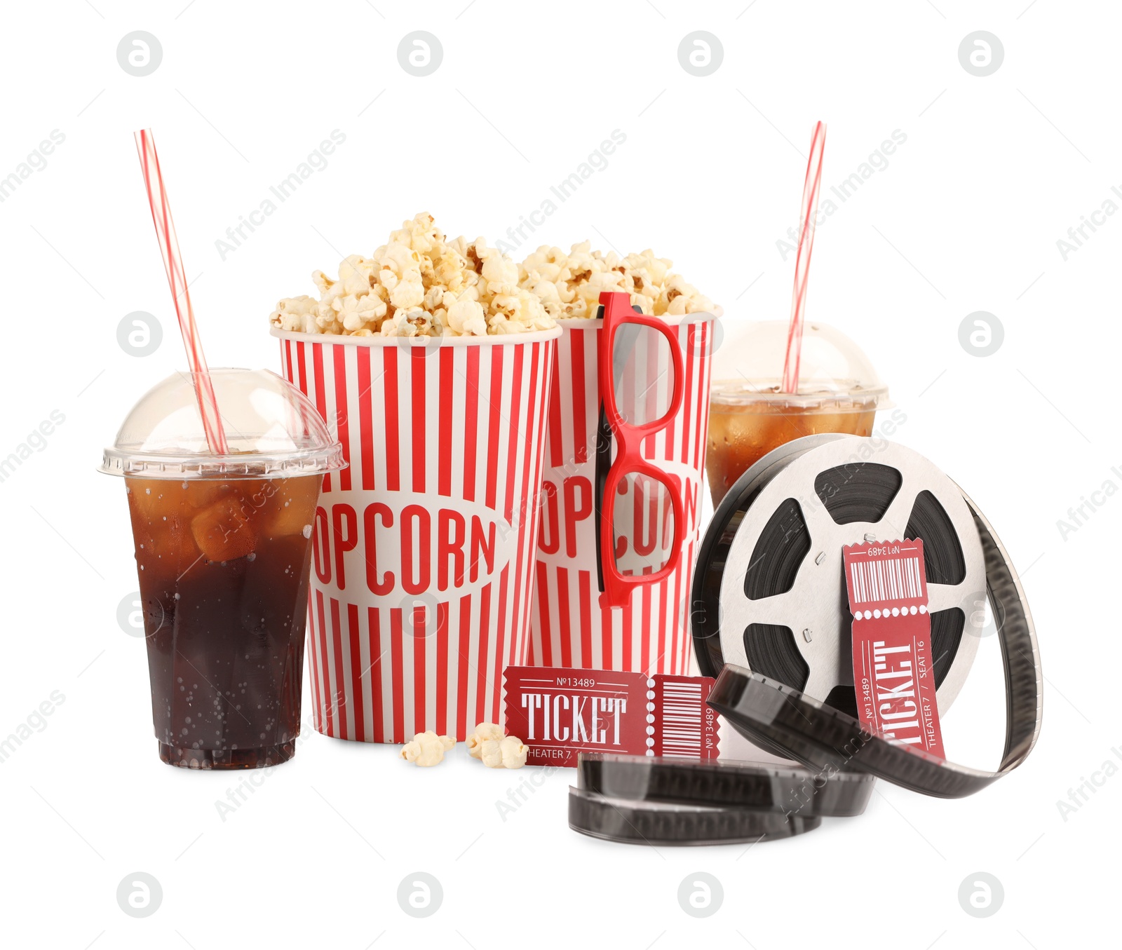 Photo of Tasty popcorn, glasses, film reel, soda drinks and movie tickets isolated on white