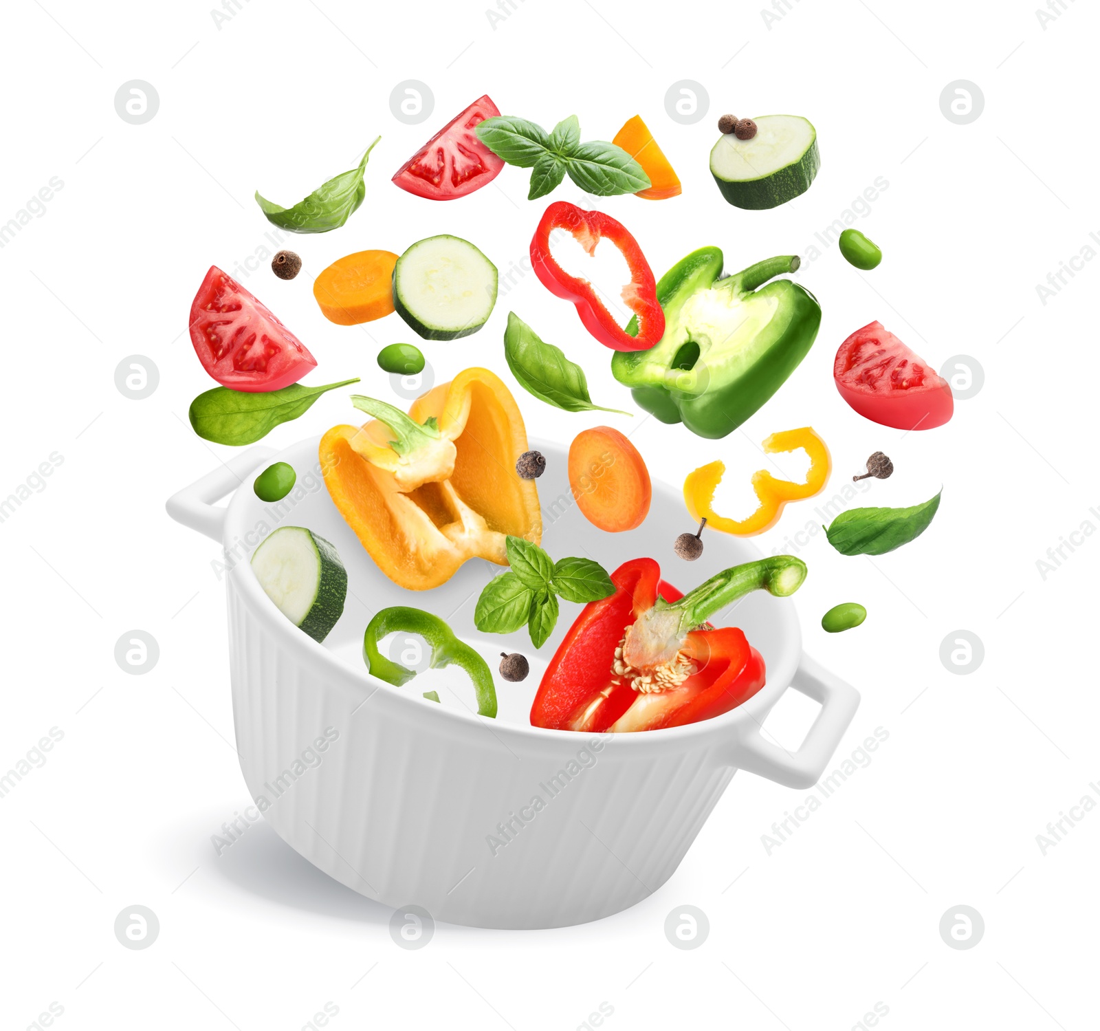 Image of Vegetables for soup and pot in air on white background