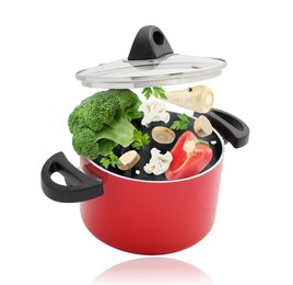 Image of Vegetables for soup and pot in air on white background