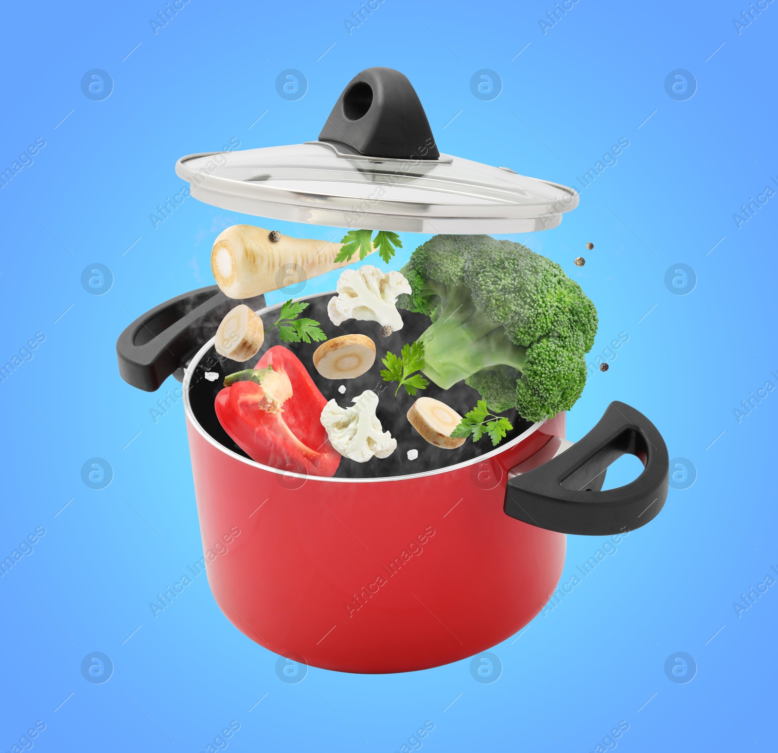 Image of Vegetables for soup and pot in air on light blue background