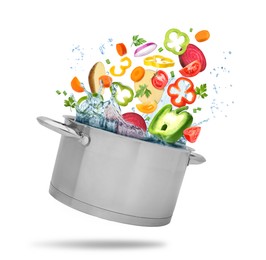 Image of Vegetables for soup and pot with water in air on white background