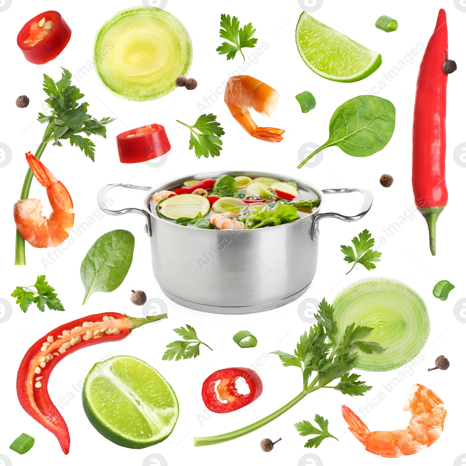 Image of Vegetables and shrimps around pot with soup on white background